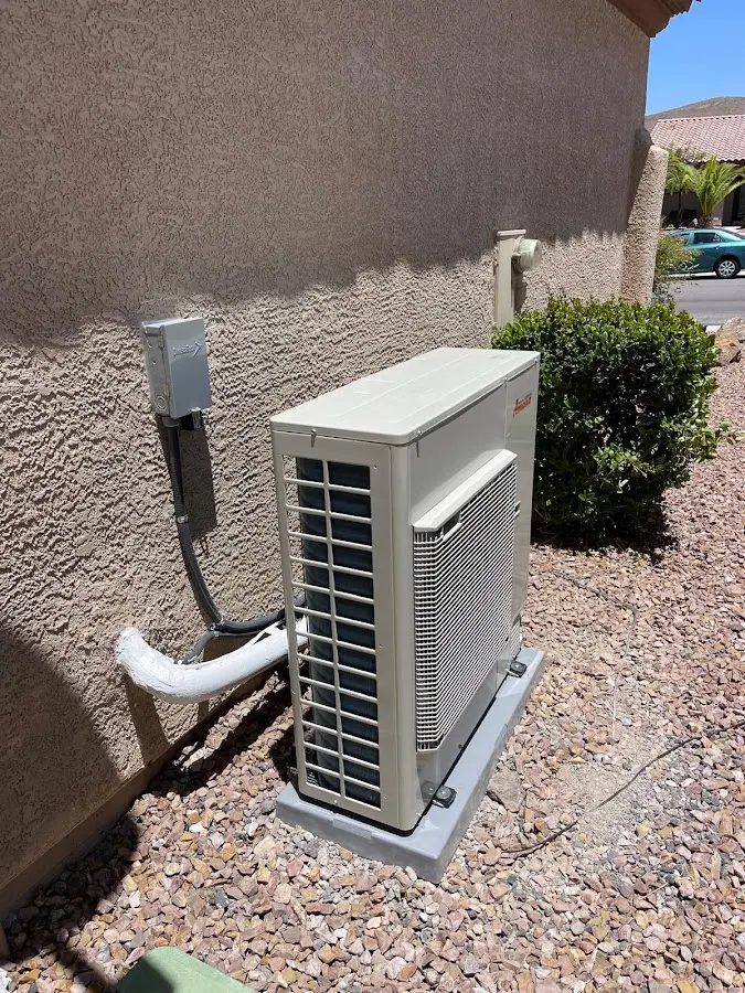 Residential air conditioning condenser unit in Sutton
